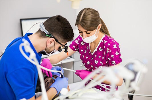 a patient receiving emergency dental treatment